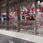 Custom reverse-printed window graphics and decorative privacy film installed on a commercial shopfront, combining branding, privacy and visual impact for a retail environment.