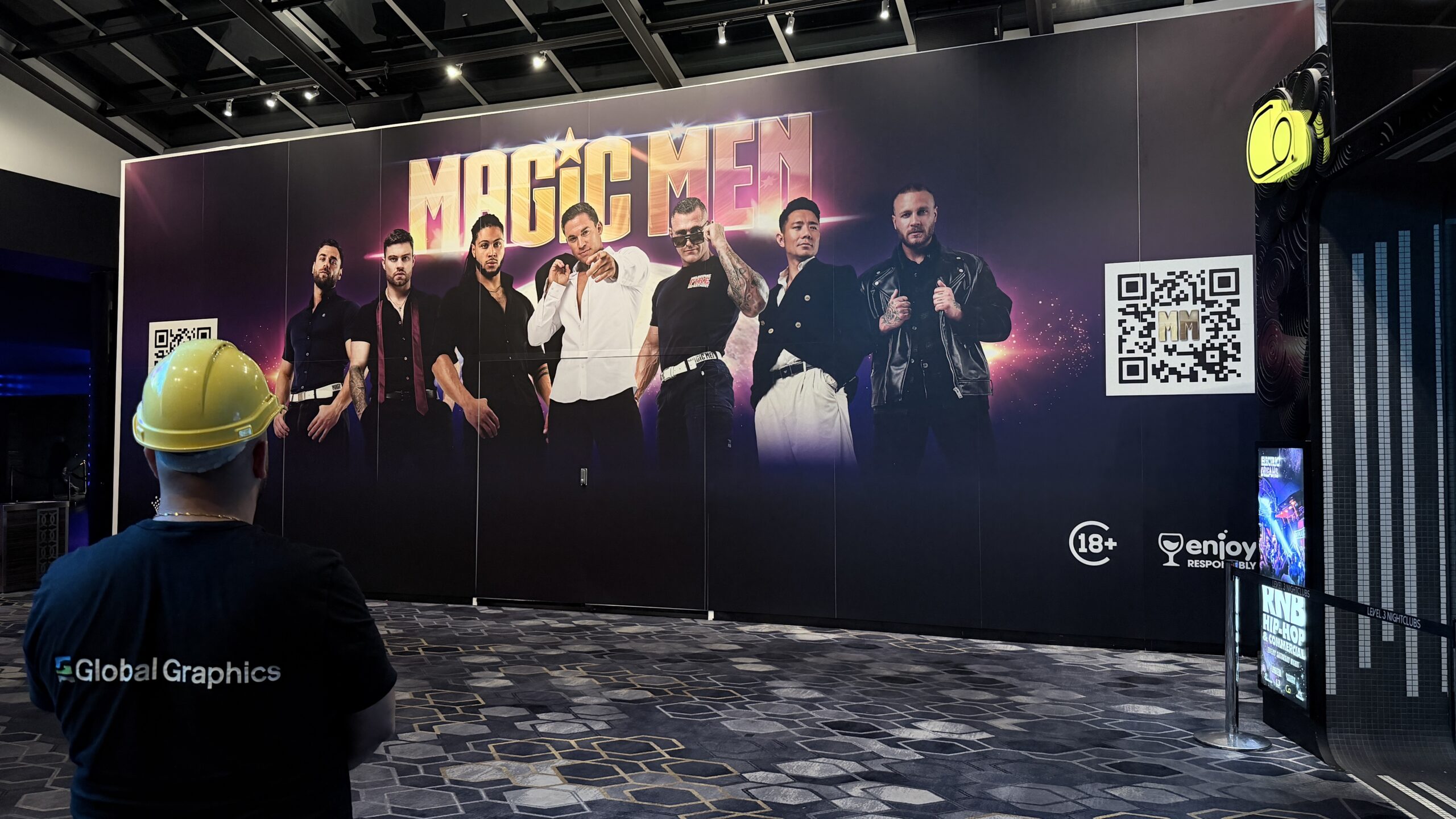 Large-format wall graphics and event branding installation featuring custom printed promotional graphics for a major entertainment venue.